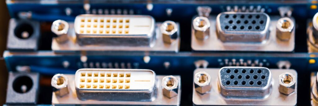 Close-up blurry metal sockets on a computer video board